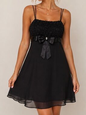 Elegant Black Mini Dress with Bow Detail